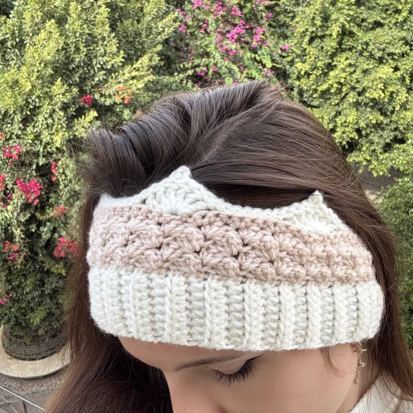 woman wearing white and pink crochet crown headband